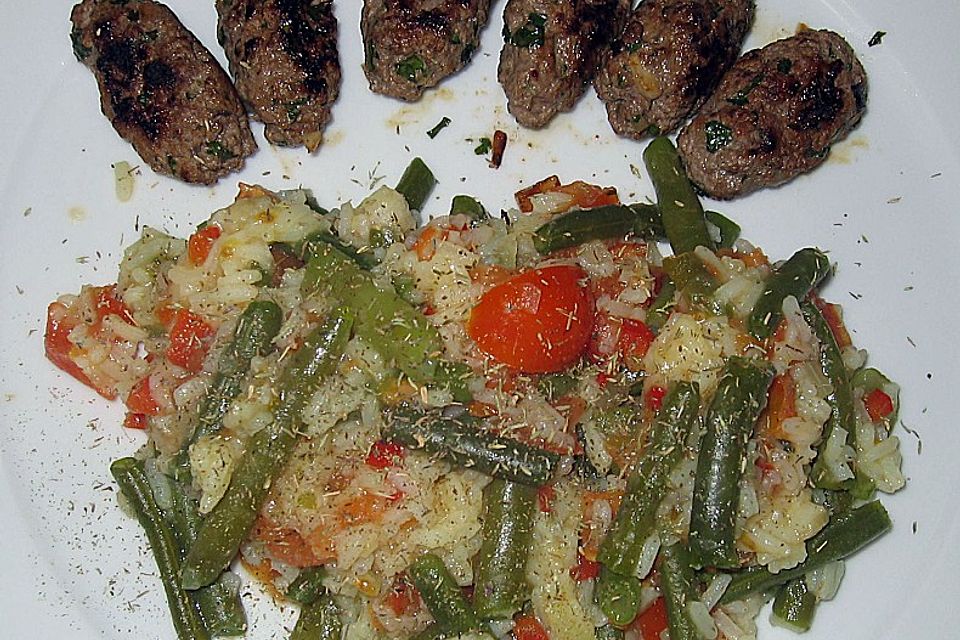 Cevapcici mit Bohnenrisotto