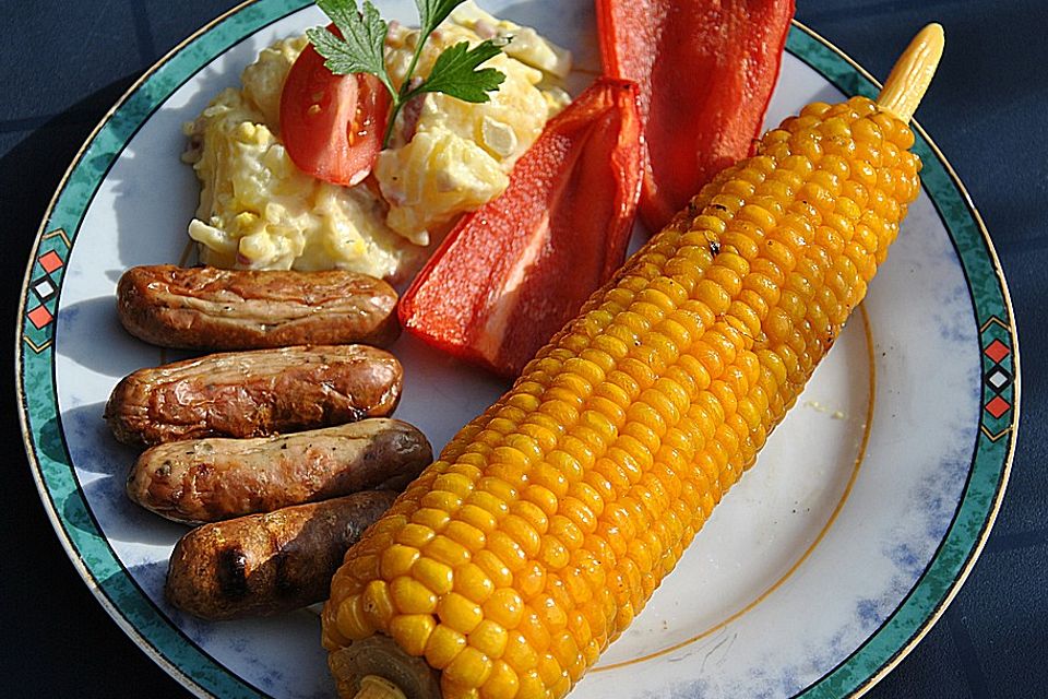 Gegrillte Maiskolben mit Honigbutter