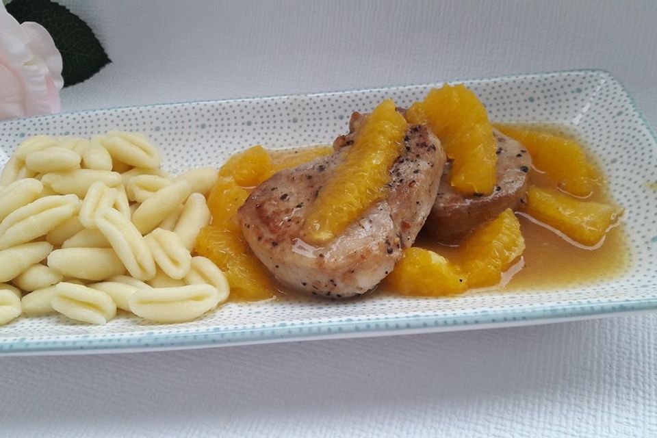 Schweinemedaillons mit Orangensauce