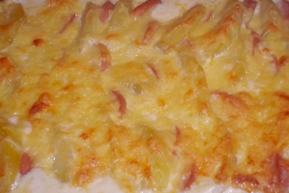 Sahniges Kartoffel - Fleischwurst - Gratin