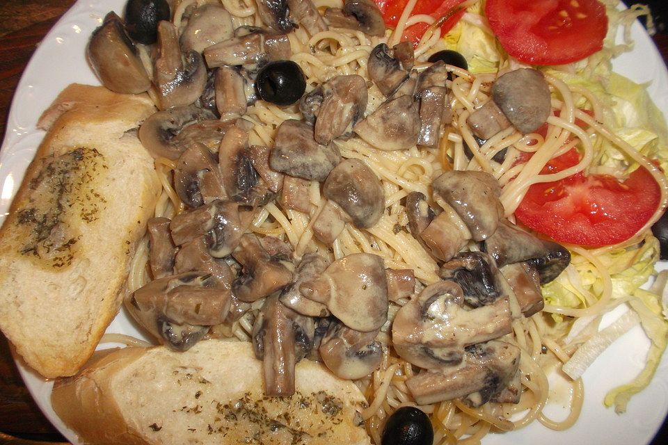 Champignons auf Spaghetti