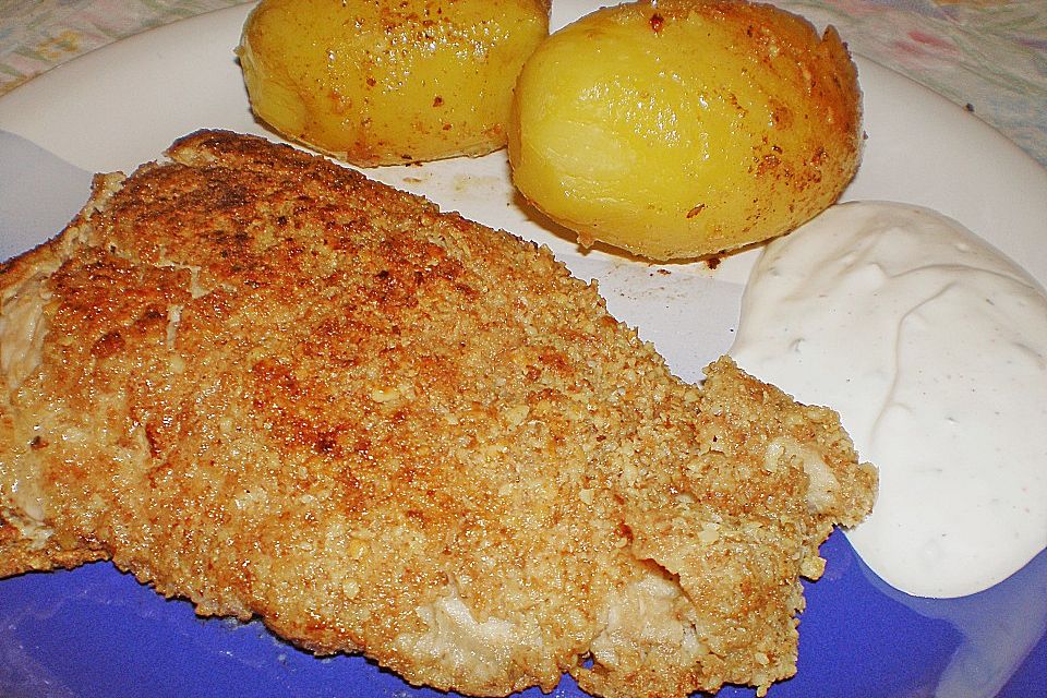 Welsfilet mit Nüssen